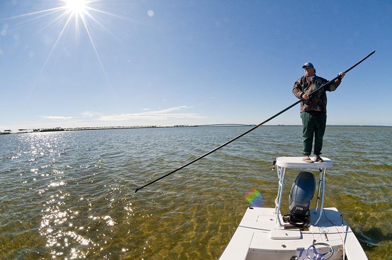 Tarpon Springs fishing guide on poling platform