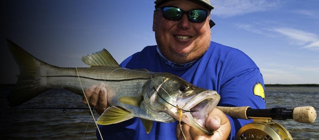 Fly fishing guide captain with a Snook